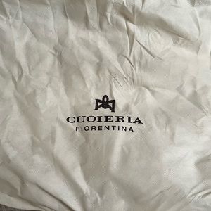 Dust bag tan in color to protect your purse or handbag